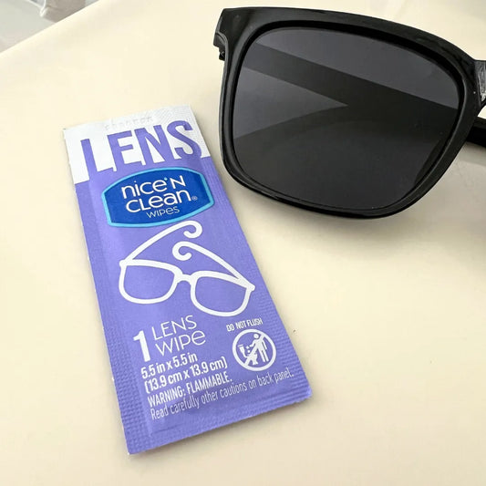 lens cleaner wipes next to a pair of glasses